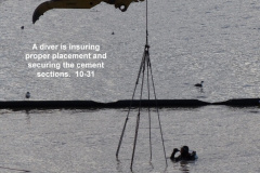 A-diver-guides-placement-of-cement-ramp-sections-10-31