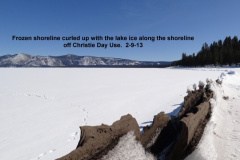 Frozen-shoreline-curled-up-with-the-lake-ice-along-the-shoreline-off-Christie-Day-Use